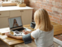 Mature woman on telemedicine online video consultation medical online consulting. Measuring blood pressure, digital device tonometer for control health at home